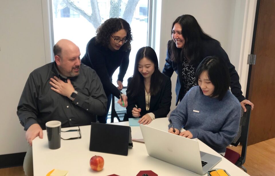 Group collaborating in a conference room